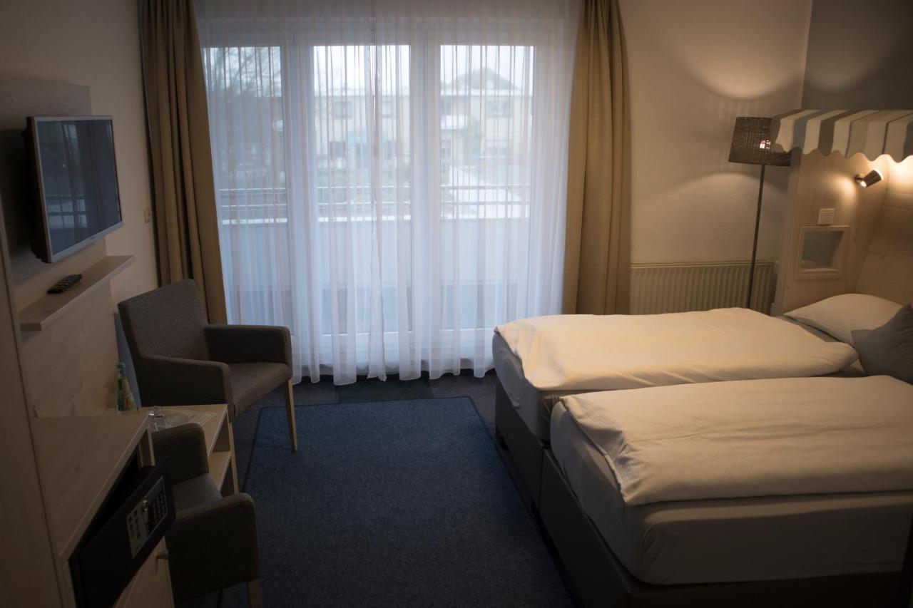 Hotel Am Friesenstrand Tossens Eksteriør bilde